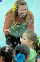 Darlene DeLay performing with children